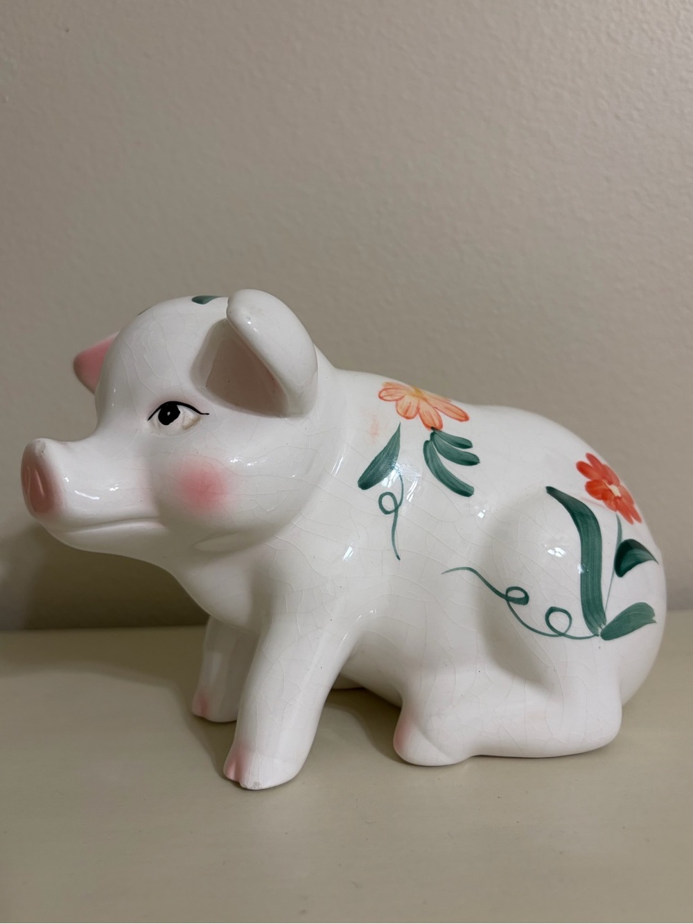 Hand-Painted White Ceramic Piggy Bank with Floral Motif